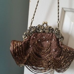 Brown beaded clutch